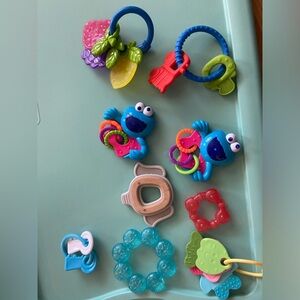 Baby toys, rattlers and teething rings, 9 piece set, assorted types.